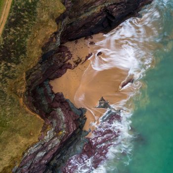 Aerial view of a cove on the South West Coastal Path