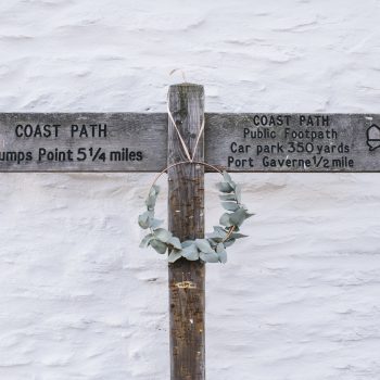 Christmas wreath on the South West Coast Path sign