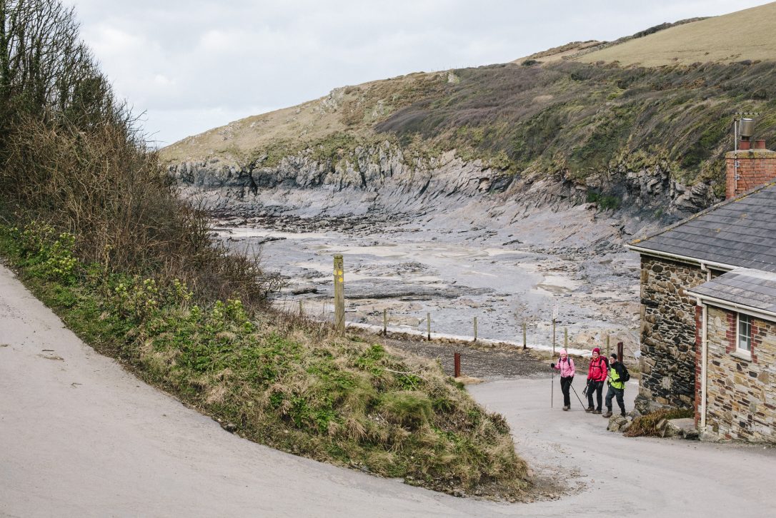 Walkers in Port Quin, North Cornwall