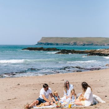 Family picnic on Greenaway Beach