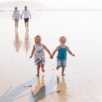 Family enjoying Polzeath Beach