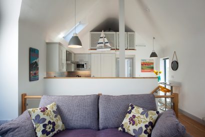 View across to the kitchen at Endymion, a self-catering holiday home in New Polzeath. North Cornwall
