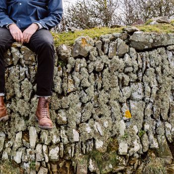 Walker on a Cornish stone wall