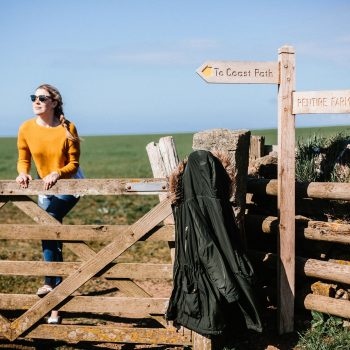 Walker on the South West Coast Path near Polzeath